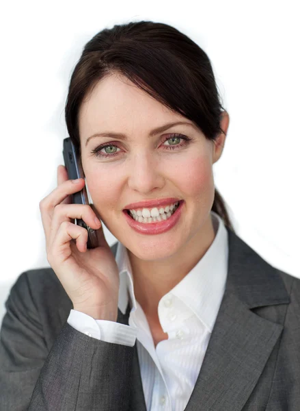 Mulher de negócios cativante usando um telefone celular — Fotografia de Stock