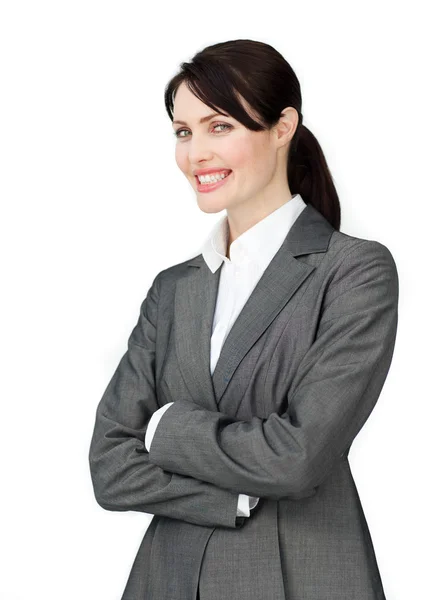 Stralende zakenvrouw met gevouwen armen — Stockfoto