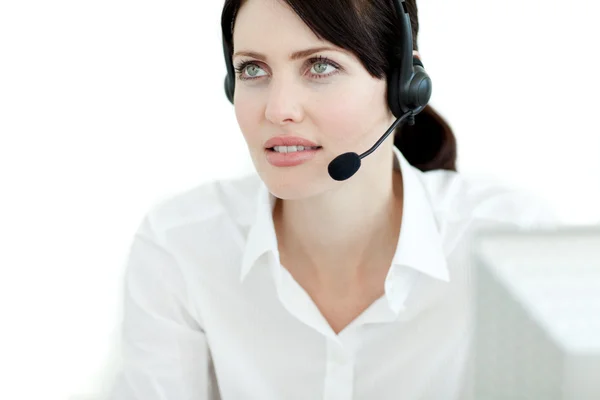 Serious businesswoman with headset on — Stock Photo, Image