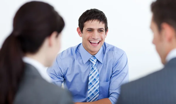 Happy businessman at a meeting — Stock Photo, Image
