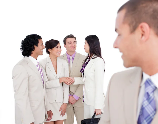 Positive business co-workers shaking hands — Stock Photo, Image