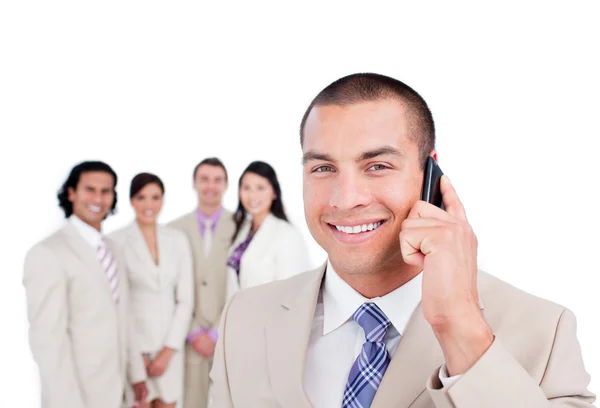 Empresário atraente falando ao telefone — Fotografia de Stock