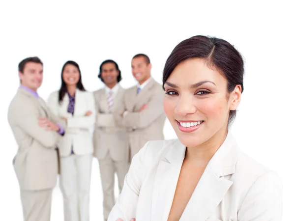 Portrait of latin businesswoman smiling with his team — Stock Photo, Image