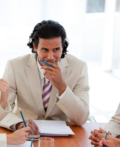 Serious manager talking with his team — Stock Photo, Image