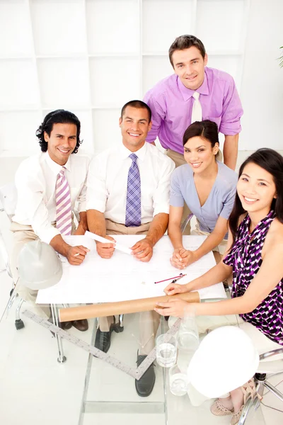 Multi-ethnic group of architects in a meeting — Stock Photo, Image