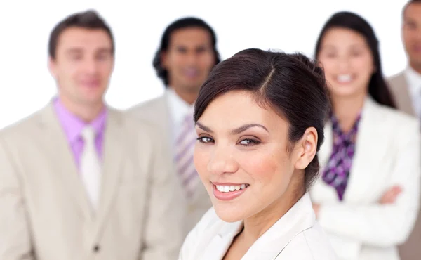 Charming female executive presenting her team — Stock Photo, Image