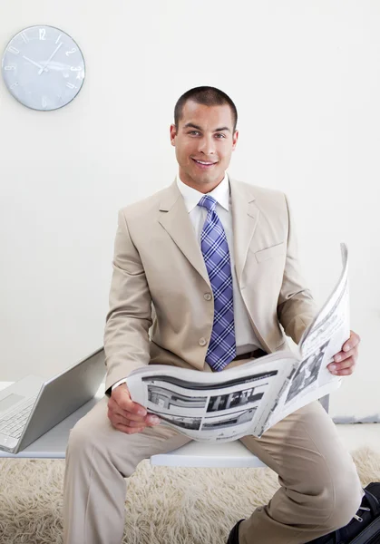 Charming manager reading a newspaper — Stock Photo, Image
