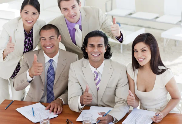 Successful business team with thumbs up — Stock Photo, Image
