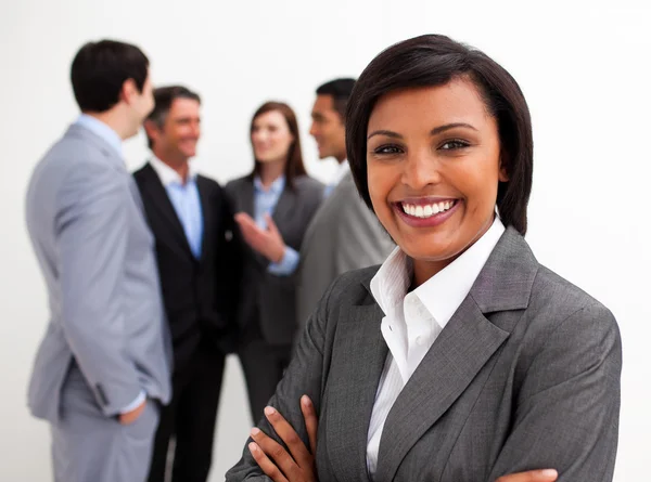 Beautiful businesswoman leading her team — Stock Photo, Image