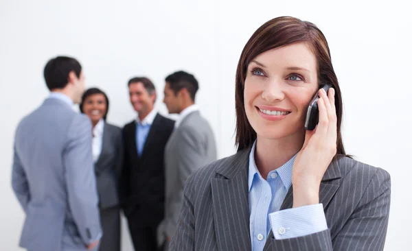 Portrait of smiling businesswoman on phone — Stock Photo, Image
