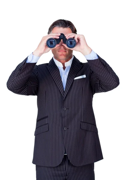 Homem de negócios sério usando binóculos — Fotografia de Stock