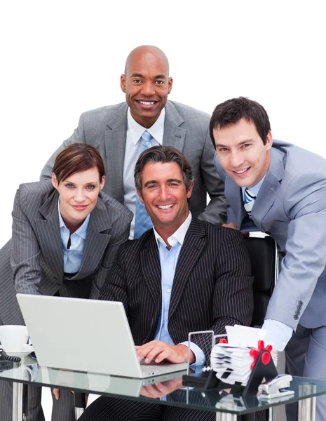 Ambitious business team working at a computer — Stock Photo, Image