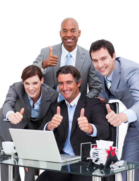 Enthusiastic business team with thumbs up — Stock Photo, Image