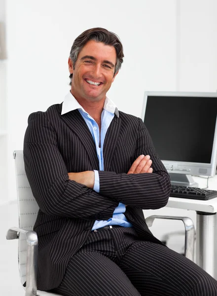 Attractive businessman with folded arms — Stock Photo, Image