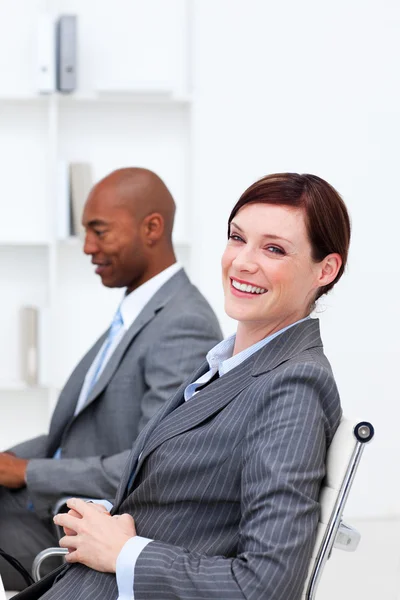 Portrait of two smiling multi-ethnic colleagues — Stock Photo, Image