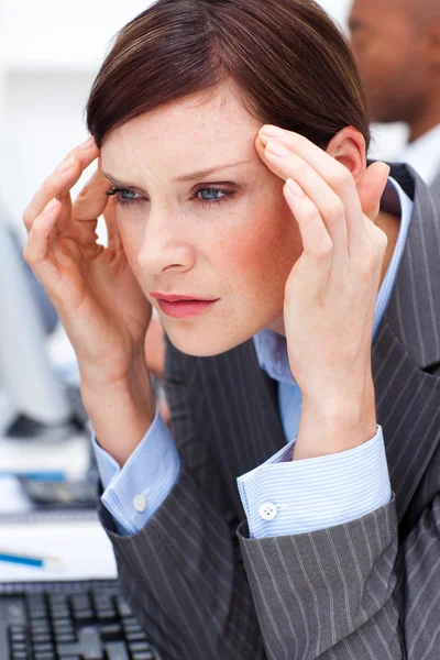 stock image Young Businesswoman having a migraine