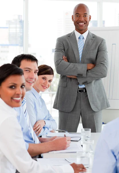 International business team smiling at the camera — Stock Photo, Image