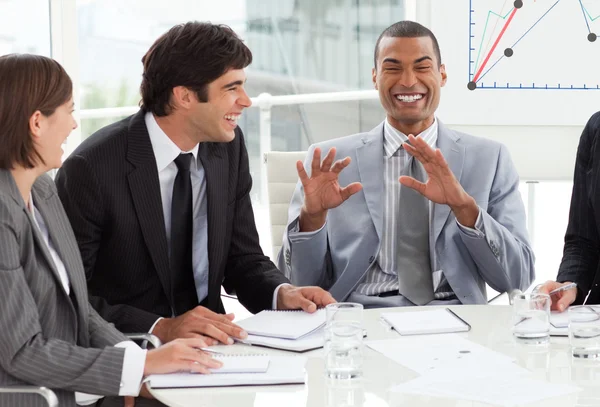 Happy international business discussing a budget plan — Stock Photo, Image