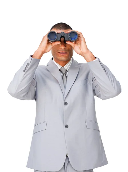 Attractive Ethnic businessman using binoculars — Stock Photo, Image