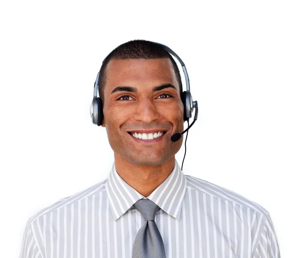 Aantrekkelijke etnische zakenman met hoofdtelefoon op — Stockfoto