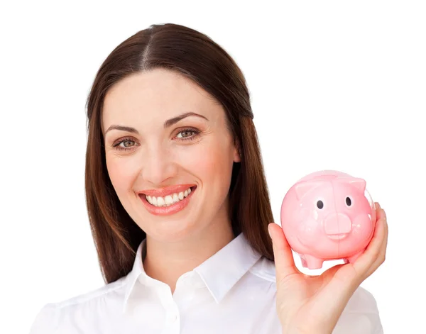 Usměvavá mladá podnikatelka drží prasátko — Stock fotografie