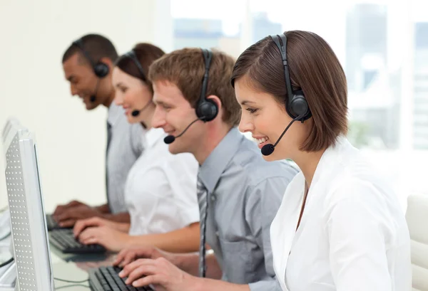 Multi-ethnic business in a call center — Stock Photo, Image