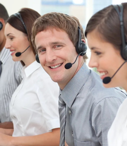 Blond businessman smiling at the camera — Stock Photo, Image