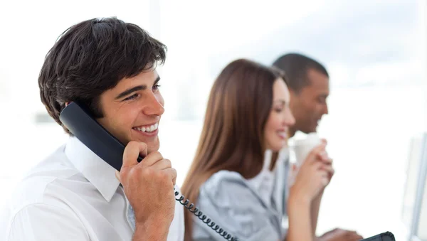 Assertive businessman talking on phone — Stock Photo, Image
