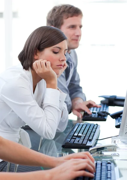 Young businesswoman getting bored at work — Stock Photo, Image