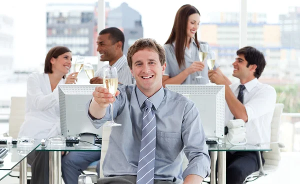 Animated business team drinking champagne — Stock Photo, Image