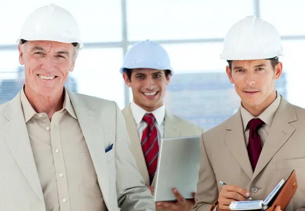 A group of architect smiling at the camera — Stock Photo, Image