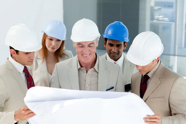 A group of architect discussing a project Stock Photo