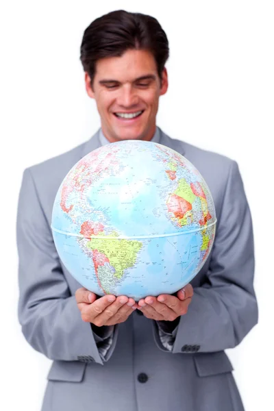 Empresario asertivo sonriendo a la expansión global de negocios Imagen de archivo