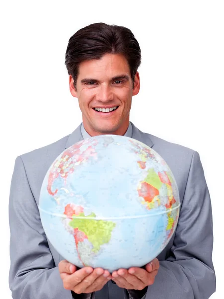 Empresario seguro de sí mismo sosteniendo un globo terrestre Imágenes de stock libres de derechos