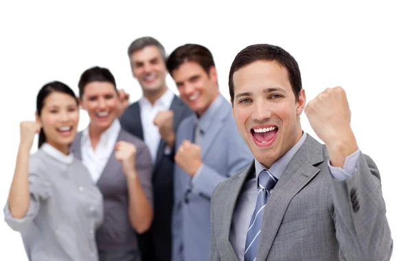 Successful business team punching the air in celebration — Stock Photo, Image