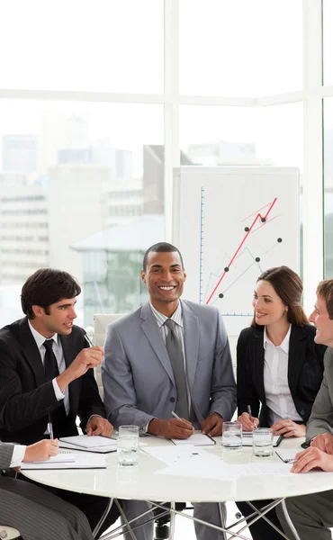 Afro-american manager in a meeting with his team — Stock Photo, Image
