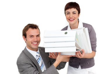 Young Businesswoman bringing a pile of folders to her manager clipart