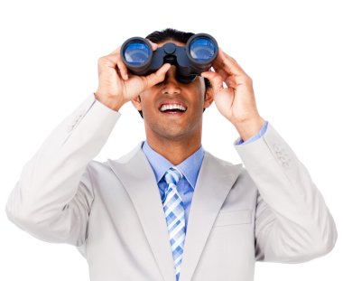 Smiling businessman using binoculars clipart