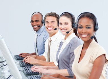 Confident business working in a call center clipart