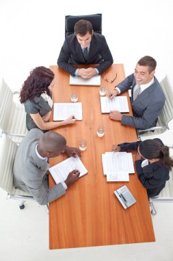 High Angle of businessteam having a meeting clipart