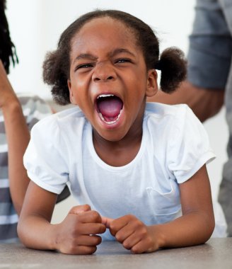 Angry little girl shouting clipart