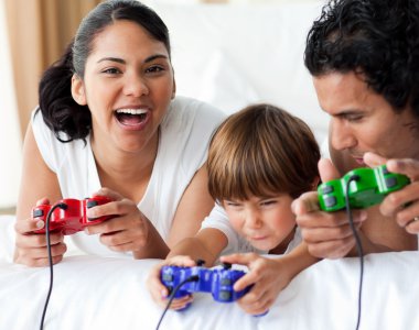 Happy family playing video games clipart