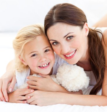 Portrait of a joyful mother and her daughter clipart