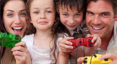 Happy family playing video games clipart