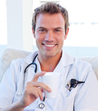 Positive doctor having a break clipart