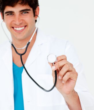 Close-up of a young doctor with a stethoscope clipart