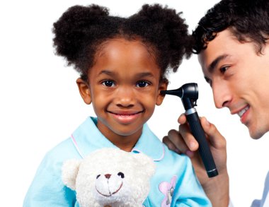 Confident doctor examining his young patient clipart