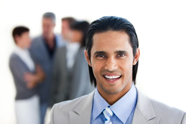 Charming businessman in front of his team — Stock Photo, Image