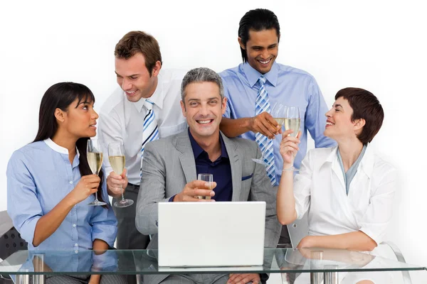 Cheerful business team toasting with Champagne — 图库照片