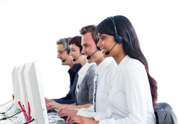Concentrated customer service representatives with headset on — Stock Photo, Image